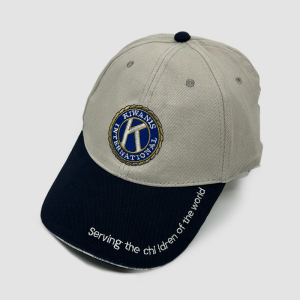 Kakhi cap "serving the children of the world"